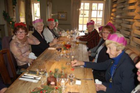 Members and volunteers enjoying a Christmas lunch