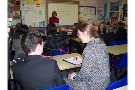 Volunteers assisting a  pupil at Linton VC