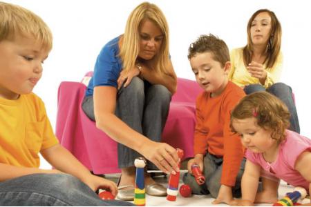 family and volunter playing