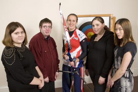 Young people with our patron, archer Nicky Hunt